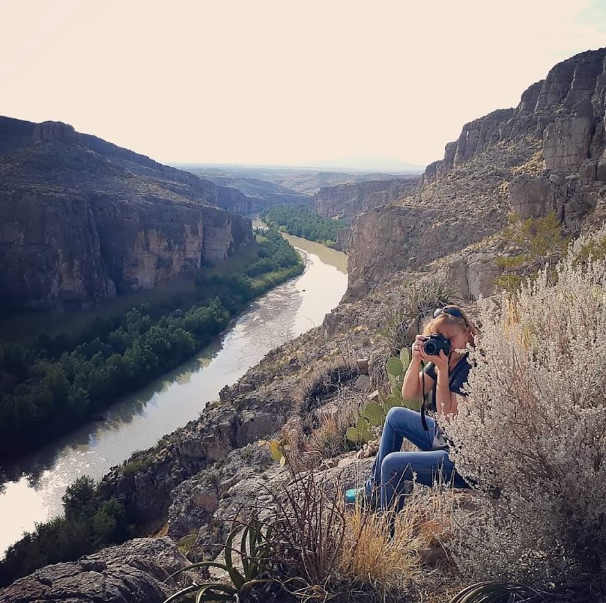 Stacy on a mountain overlooking the Rio Grande while traveling.
